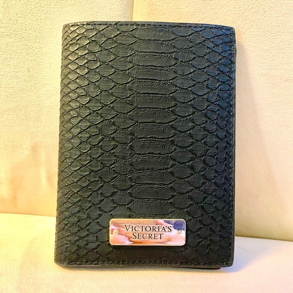 Black snakeskin texture Victoria’s Secret passport holder. Used only once.